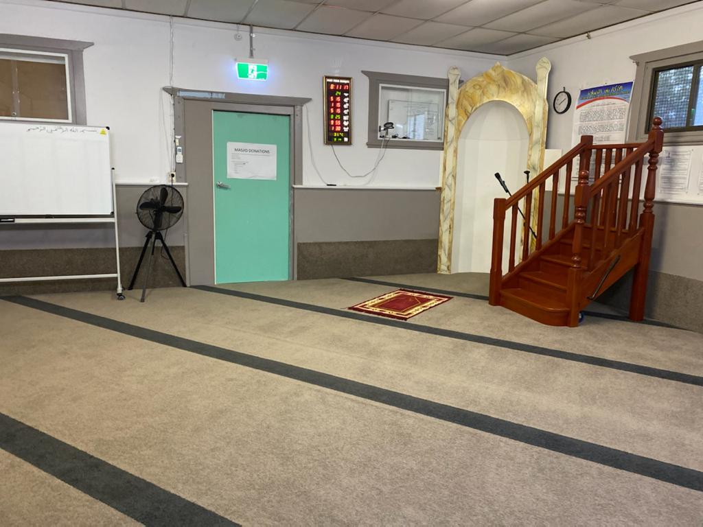 Prayer hall with mihrab and minbar